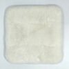 white sheepskin seat cushion